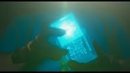 The cube has a rather interesting inscription (Image via YouTube/Warner Bros)